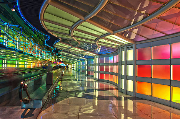 Passenger Tunnel, Chicago O'Hare Airport Passenger tunnel between two terminals under the air field at Chicago O'Hare Airport elevated walkway photos stock pictures, royalty-free photos & images