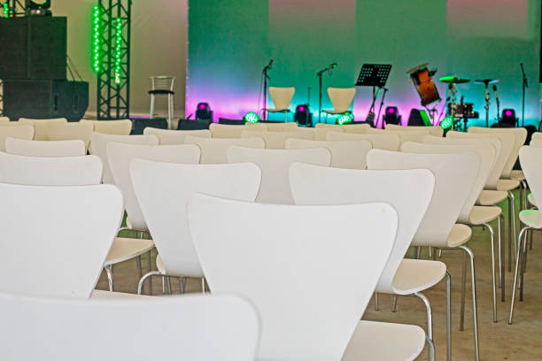 istock empty conference room with white chairs before the concert 1509042009