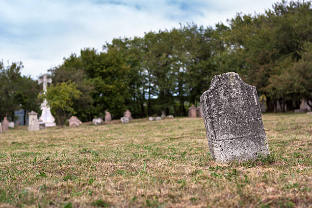 istock Weathered tombstone in an old cemetery 150904836