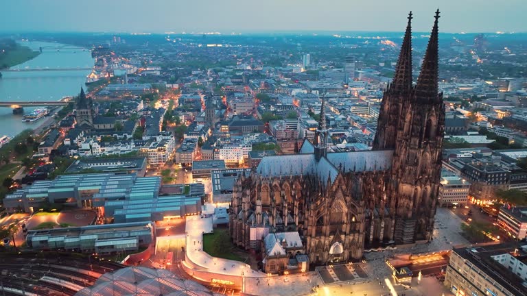 4k Aerial view of cityscape of Cologne, Germany, Europe. Cathedral Church of Saint Peter in historic city center