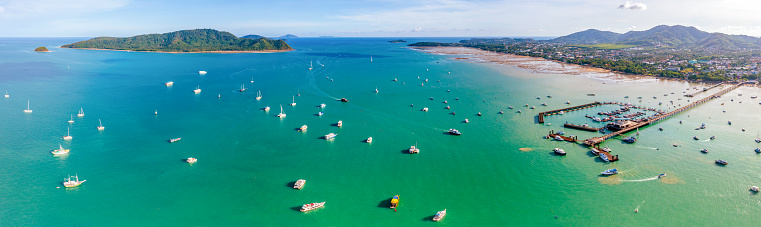 panoramic of Chalong pier Phuket in aerial view landscape. Seascape at yacht club with sailboats.