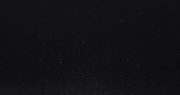 istock hot of dust particles explosion over black background 1509074658