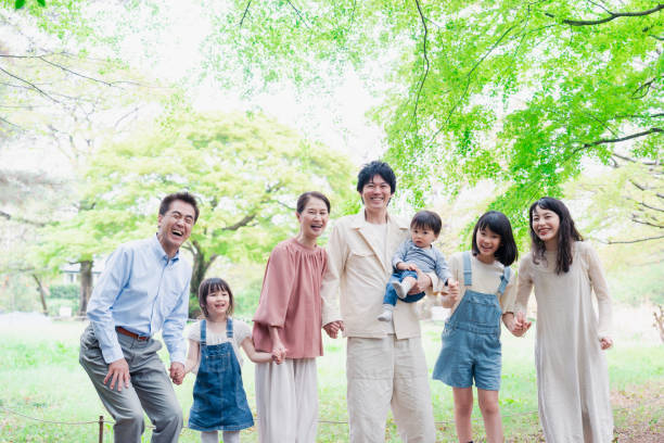 istock A three-generation family smiling in nature 1509085953
