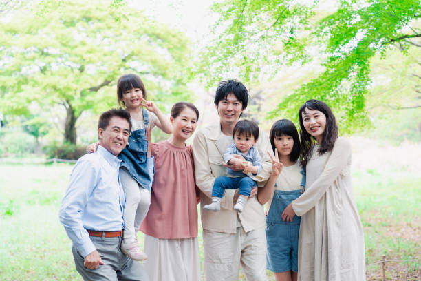 istock A three-generation family smiling in nature 1509085957