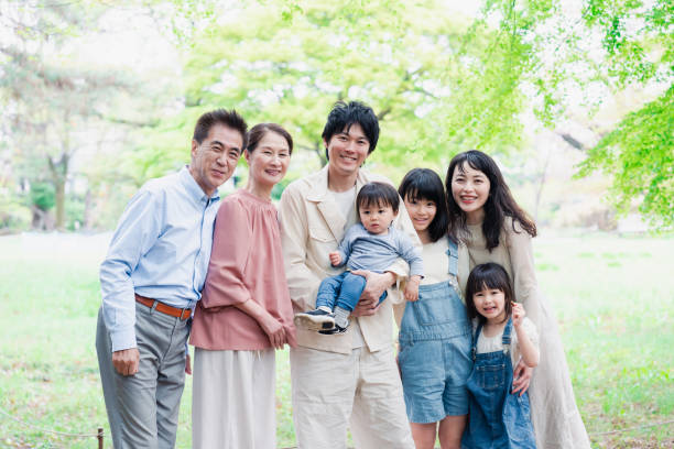istock A three-generation family smiling in nature 1509085965