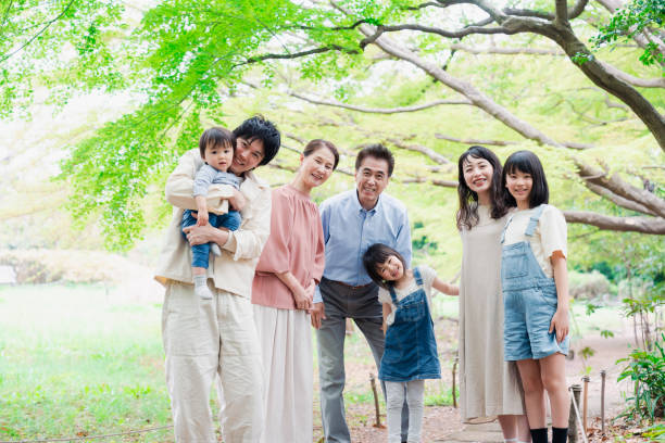 istock A three-generation family smiling in nature 1509085987