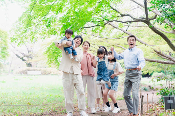istock A three-generation family smiling in nature 1509085988
