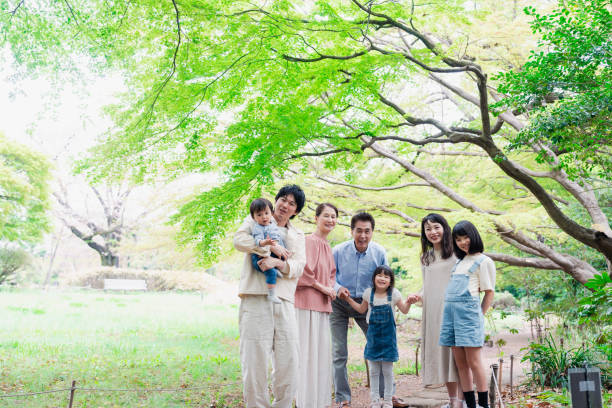 istock A three-generation family smiling in nature 1509085997