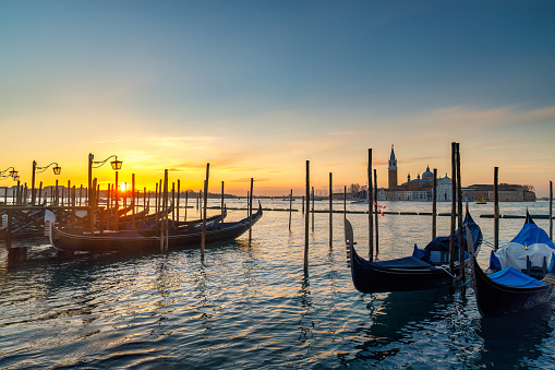 Young adult asian couple exploring Venice, Italy