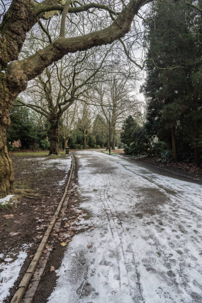 istock Snowfall on the pathway at Longton park in Staffordshire 1509092674