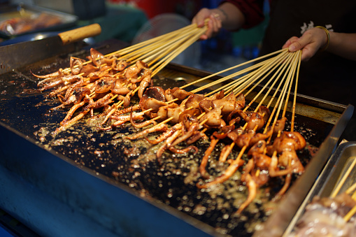 Street snack grilled squid skewers