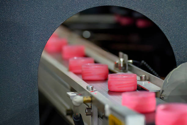istock The pink water bottle cap production process by high speed machine. 1509099254