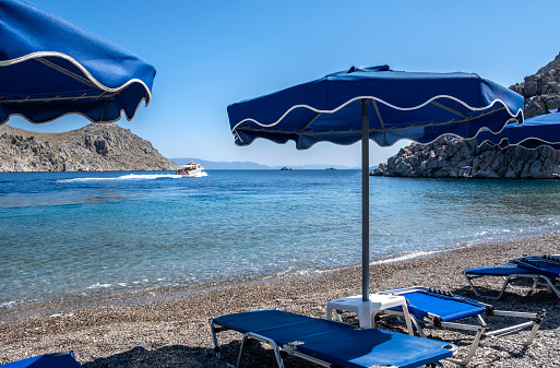 Symi Island Water Taxi Transporting Tourists to and from the Pebbly St. Nicholas Beach on Symi Greece