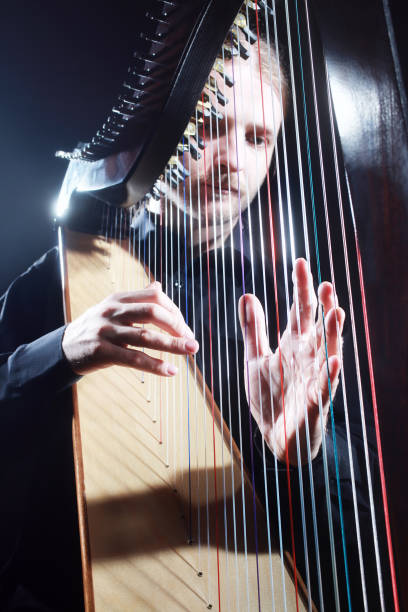 istock Irish harp player. Musician harpist 1509108101
