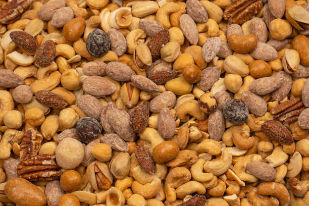 istock A group of almonds, pistachios, walnuts, macadamia, cashews. 1509123599