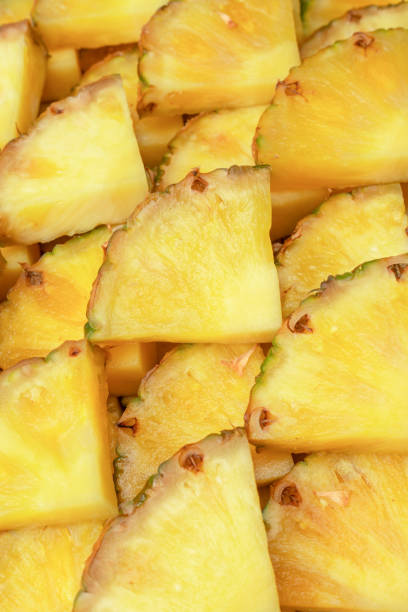 istock Pineapple juicy yellow slices as a background. 1509123603