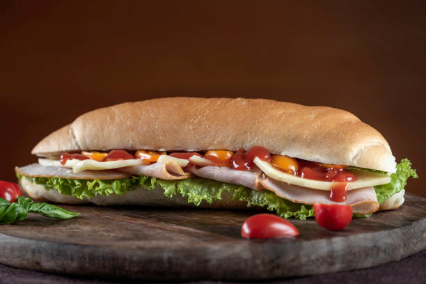 istock Sandwich with sesame, cheese, green salad and cherry tomatoes 1509146564