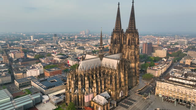 4k Aerial view of cityscape of Cologne, Germany, Europe. Cathedral Church of Saint Peter in historic city center