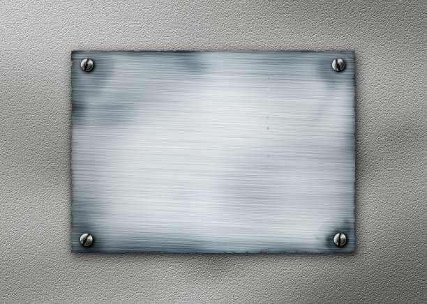 istock metal plate on concrete wall 150916874