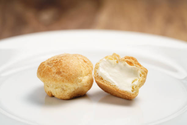istock profiteroles on plate closeup one sliced 1509201331