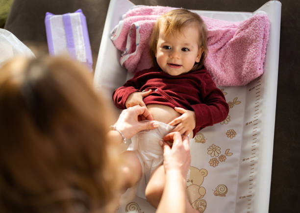 istock Baby in bedroom getting diaper changed 1509201348
