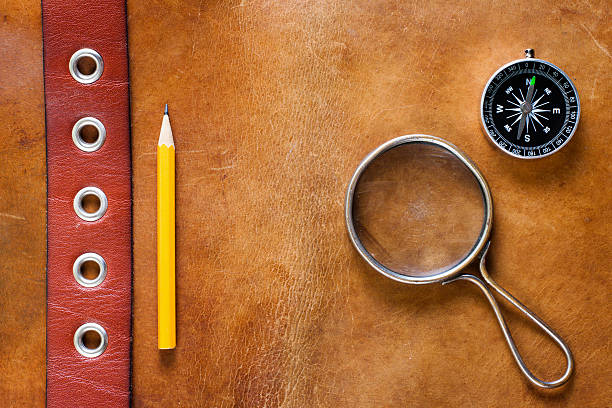 istock Old leather with magnifying glass, compass and pencil 150920330