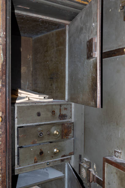 istock An old vintage rusty metal safe with an open door. Antique office safe for storing documents 1509229317