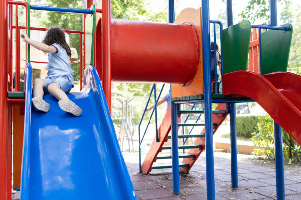 istock Happy little boy playing at the modern playground. 1509245707