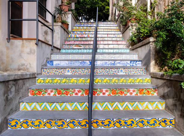 Staircase decorated with ceramic tiles and colorful traditional sicilian ornaments in Cefalu old town, medieval village on Sicily island, Italy. Popular tourist attraction in Province of Palermo Staircase decorated with ceramic tiles and colorful traditional sicilian ornaments in Cefalu old town, medieval village on Sicily island, Italy. Popular tourist attraction in Province of Palermo. cefalu stock pictures, royalty-free photos & images