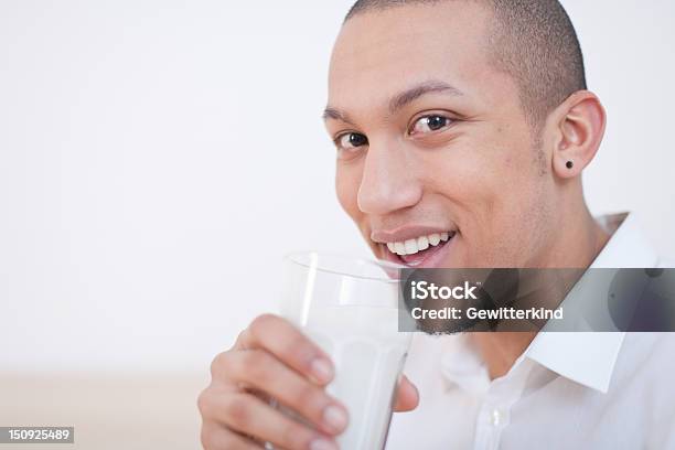 Young Africanamerican Man Drinking Milk Stock Photo - Download Image Now -  20-29 Years, Adult, African Ethnicity - iStock