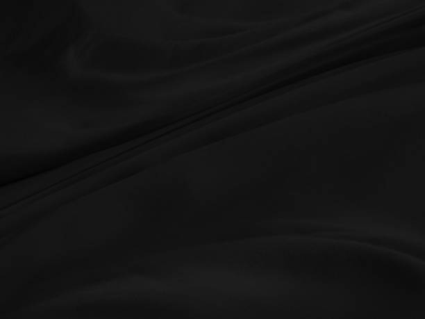 istock decorative soft fabric black smooth curve beauty abstract. textile  fashion matrix shape background 1509257398