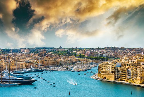 beautiful panoramic view on Valletta from the sea in Malta at sunset