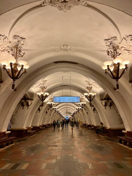Moscow, Russia - June 25, 2023: People walk through Arbatskaya subway station