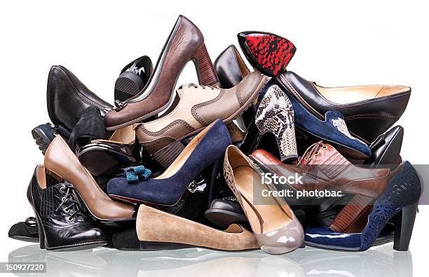 Pile Of Various Female Shoes Isolated Over White Stock Photo - Download Image Now - Shoe, Stack, Heap