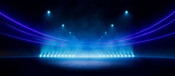 istock Abstract blue neon stadium background illuminated with lamps on ground. Science, product and sports technology background 1509289927