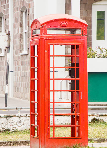 istock Red PHone Booth by Old Stone Building 150930110