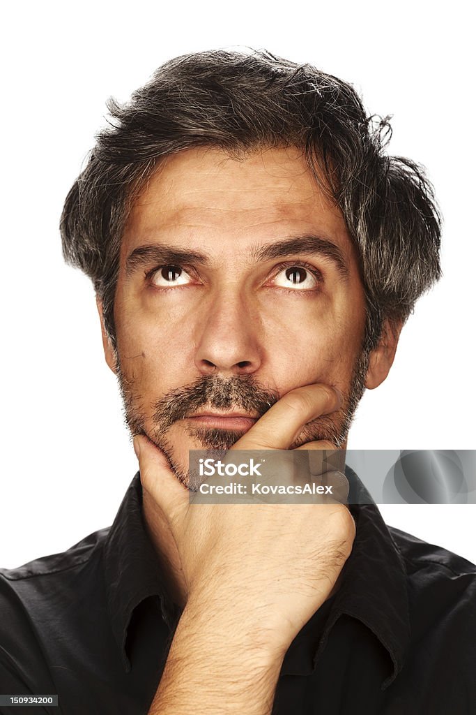 Wondering Portrait of a adult man with a wondering face. Studio shot, isolated on white background. Human Face Stock Photo