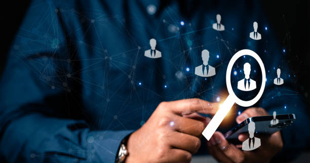 istock touching smartphone to management organization human resource. social network human community. 1509375115