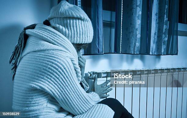 Woman Freezing At Home Stock Photo - Download Image Now - Cold Temperature, Home Interior, Radiator - Heater