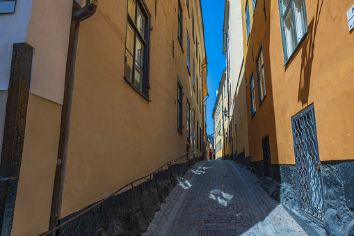 Sweden. Stockholm. 07.02.2023. Beautiful view of people on narrow cobbled streets of Stockholm's old town area.