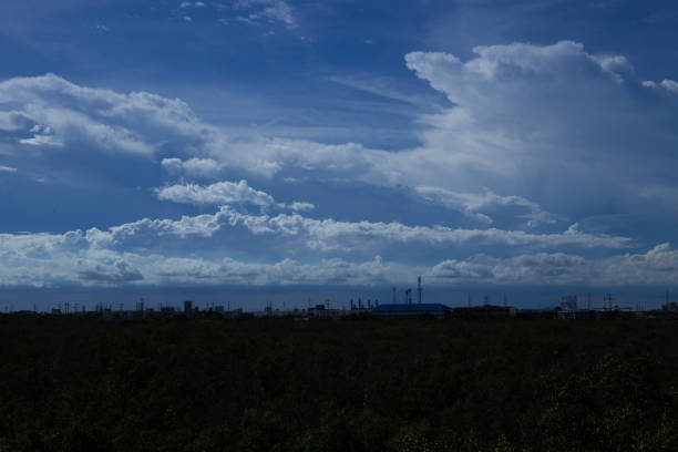 The evening sky was blue, grey, white clouds, hurry back home, rain coming. Samutprakarn, Thailand.