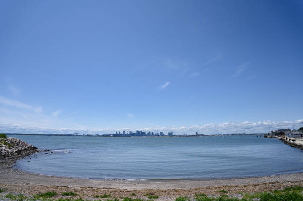 istock blue sky and city view from beach 1509434244