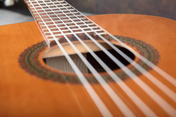 istock Mahogany classical guitar on vintage background. 1509449668