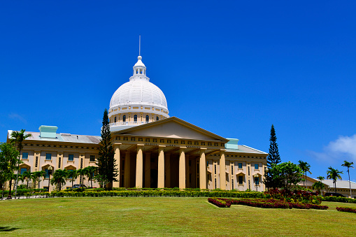 Ngerulmud, Melekeok State, Babeldaob Island, Palau: Capitol of Palau, Central Wing - neo-classical building of the Palau National Congress, the Legislative Building, the parliament of Palau - designed by Hawaiian architect Joseph Farrell. Palau has a bicameral legislature, the Palau National Congress, consisting of the House of Delegates and the Senate of Palau, which both sit at the capitol complex. In Palauan the congress is called Olbiil Era Kelulau (OEK) in Palauan or “House of Whispered Decisions\