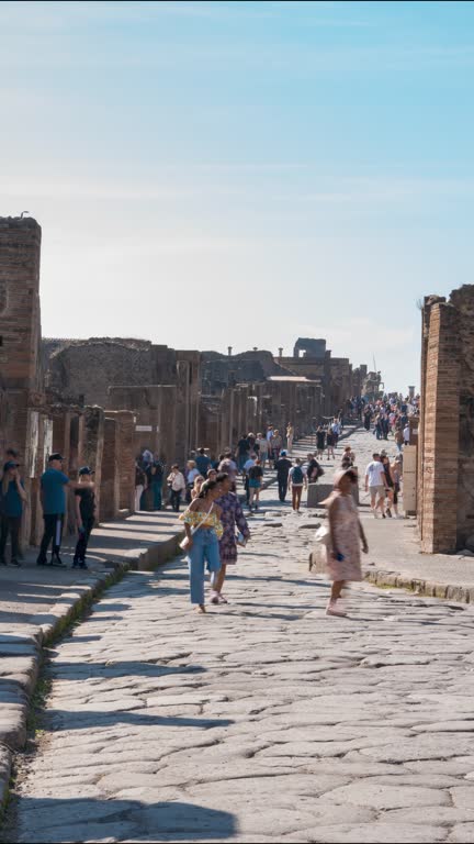 Time-Lapse of Tourists Exploring Pompeii's Ancient Ruins in Naples, Italy.