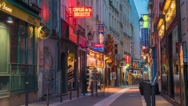 Timelapse of People Enjoying the Night Life on Famous Streets in Paris.