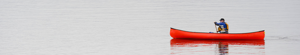 Kayak on peaceful calm water on Loch Lomond UK