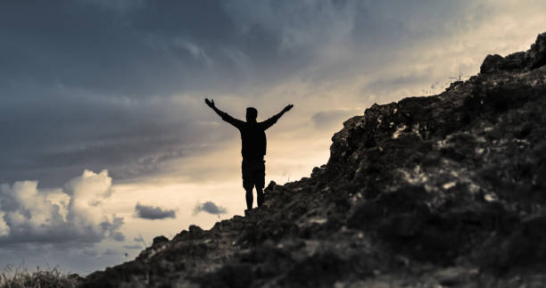 istock Man successfully finished climb the mountain. 1509513313