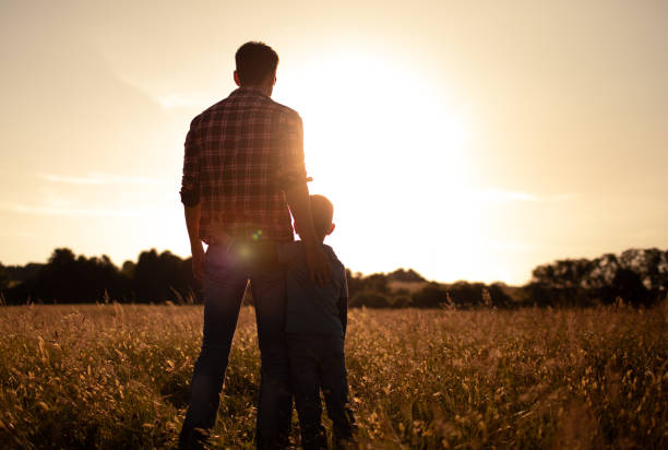 istock Young father and son spending time together bonding in nature. 1509517106