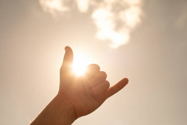 istock Man making loose sign against a sky. 1509520944